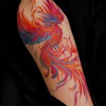 Tatouage phénix coloré réalisé par Tamara Chaudesaigues